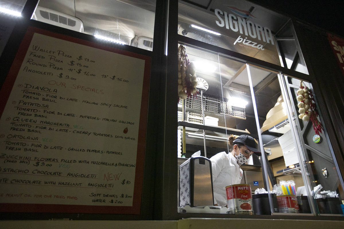 Chef Floriana Pastore works at her Signora Pizza food truck, which offers Neopolitan street foo ...