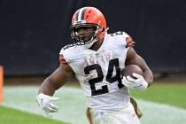 Cleveland Browns running back Nick Chubb (24) rushes for yardage during the second half of an N ...
