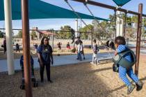 In this Nov. 19, 2018, file photo, North Las Vegas resident Theresa Igber, left, plays with her ...