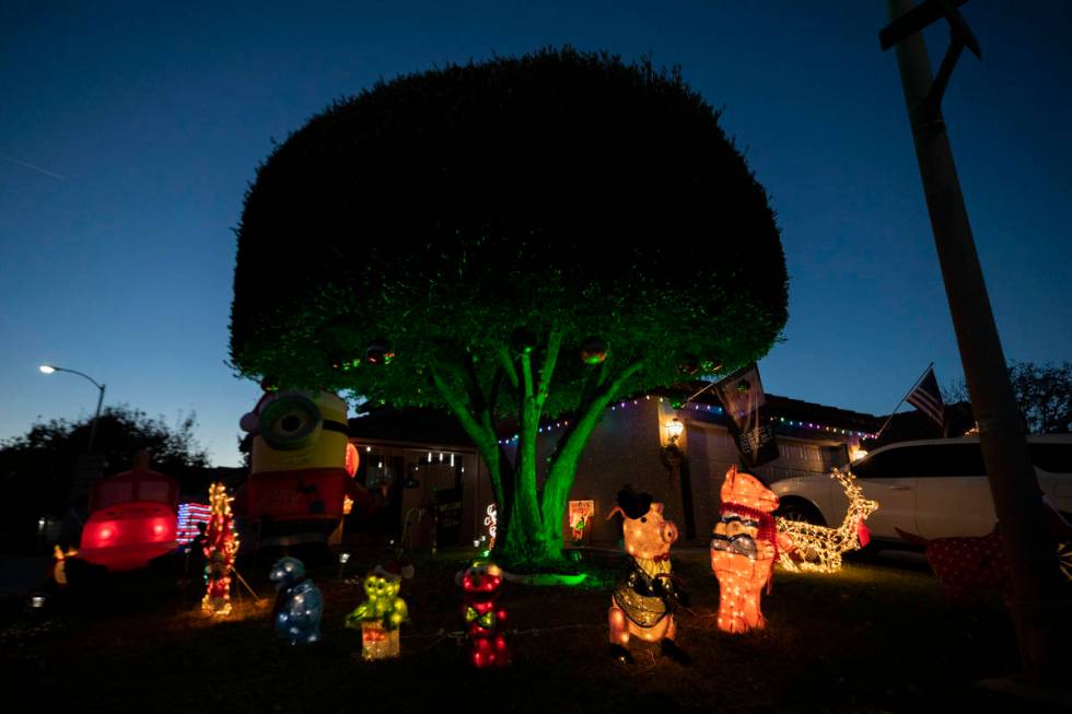 A house in the Green Valley South neighborhood off Pecos Road in Henderson is decorated for the ...