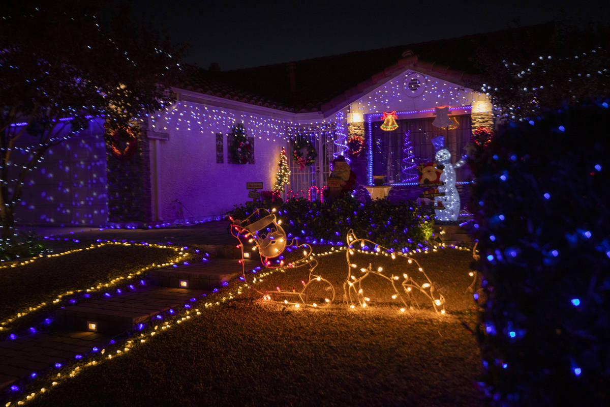 A Henderson resident's home in the Green Valley South neighborhood off Pecos Road is decorated ...