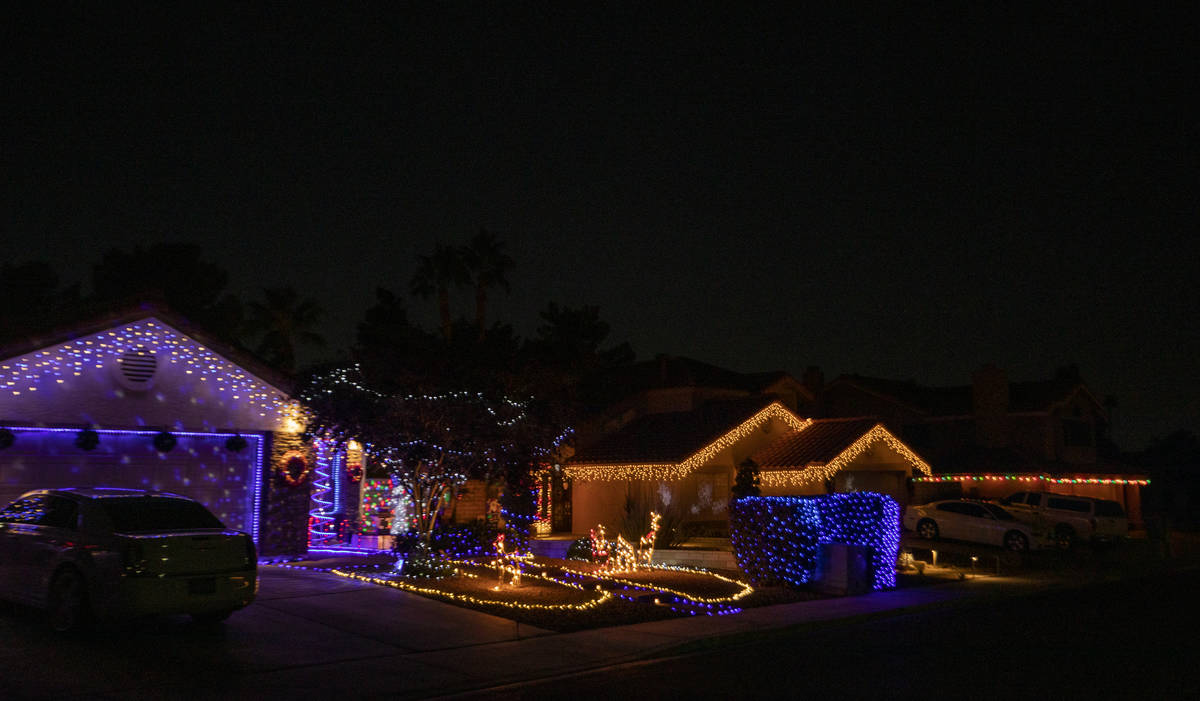 Holiday lights in the Green Valley South neighborhood off Pecos Road in Henderson are decorated ...