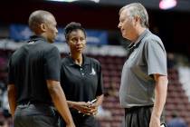 FILE - In this May 4, 2016 file photo, San Antonio Stars coach Dan Hughes talks with assistant ...
