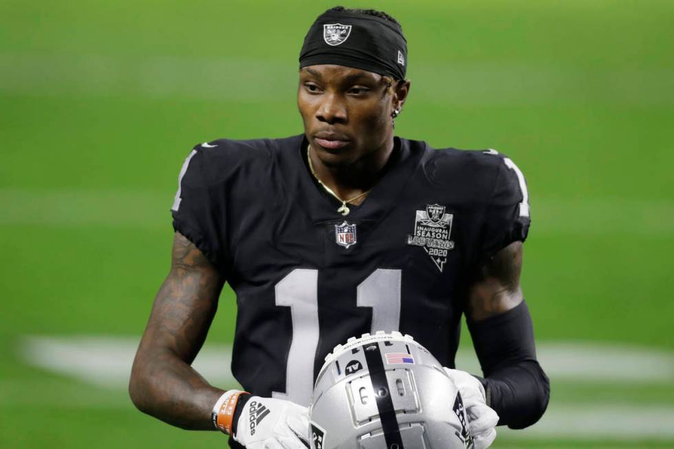 Las Vegas Raiders wide receiver Henry Ruggs III (11) warms up before an NFL football game again ...