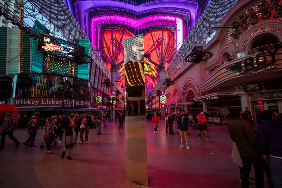 A 10-foot monolith stands under the Fremont Street Canopy in downtown Las Vegas Friday, Dec. 4, ...