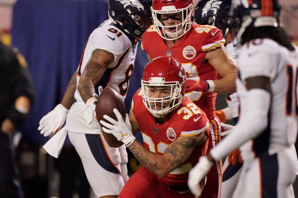 Kansas City Chiefs strong safety Tyrann Mathieu (32) intercepts a Denver Broncos quarterback Dr ...