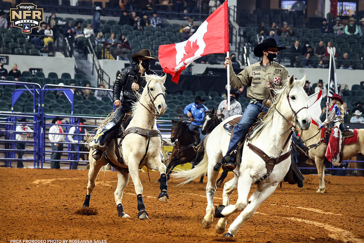 The grand entry on Day 2 of the Wrangler National Finals Rodeo at Globe Life Field in Arlington ...