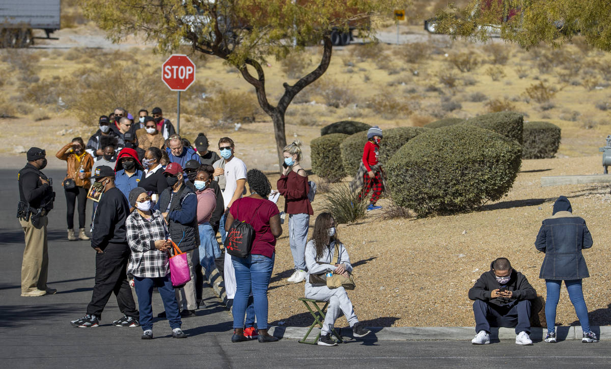Long lines of people form regularly around the parking lot outside the Nevada Department of Mot ...