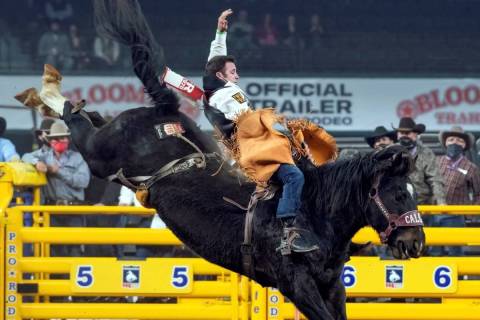 Kaycee Feild performs during the 3rd go-round of the National Finals Rodeo in Arlington, Texas, ...