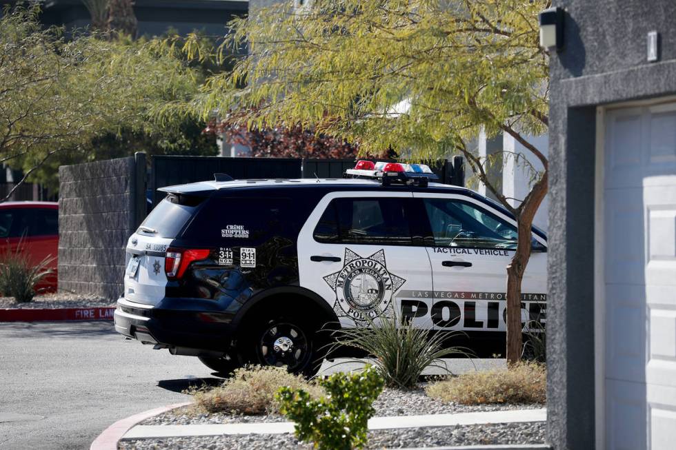 Police on the scene at an apartment complex where a man was shot and killed in the southwest La ...