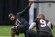 Las Vegas Raiders dfensive end Vic Beasley (51) stretches during a practice session at the Inte ...