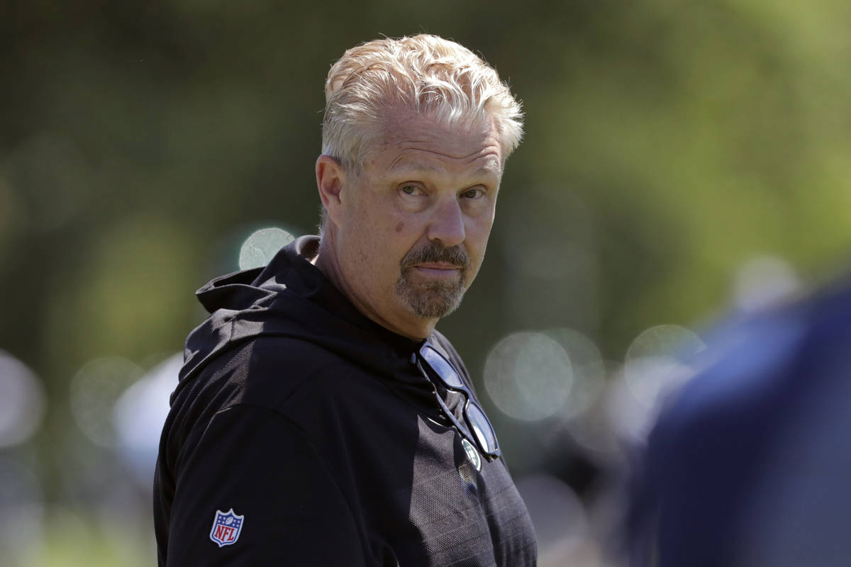 New York Jets defensive coordinator Gregg Williams looks on as his players run drills at the te ...