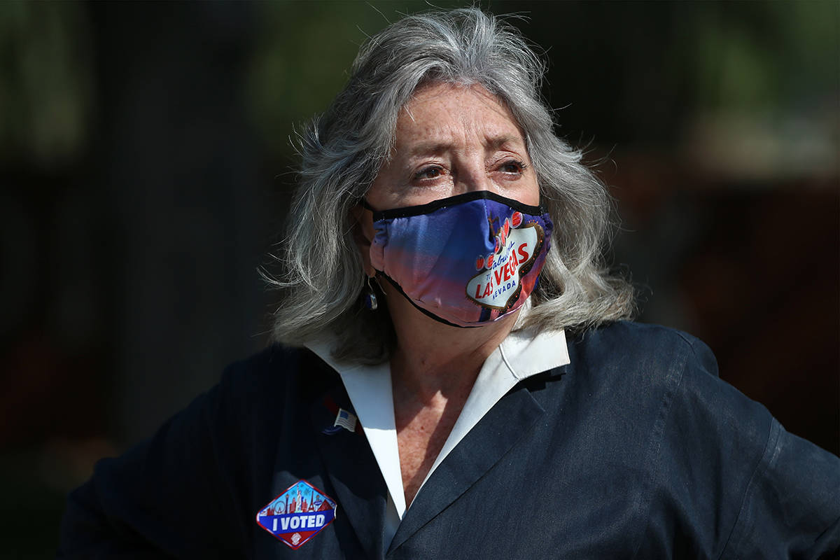 U.S. Rep. Dina Titus, D-Nev., center, participates during an early vote kick off event at UNLV ...