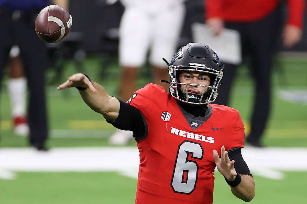 UNLV Rebels quarterback Max Gilliam (6) makes a pass against the Fresno State Bulldogs during t ...