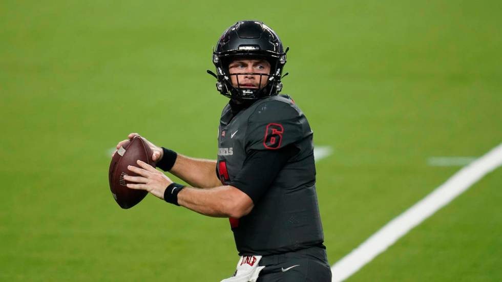 UNLV quarterback Max Gilliam (6) plays against Nevada during the second half of an NCAA college ...