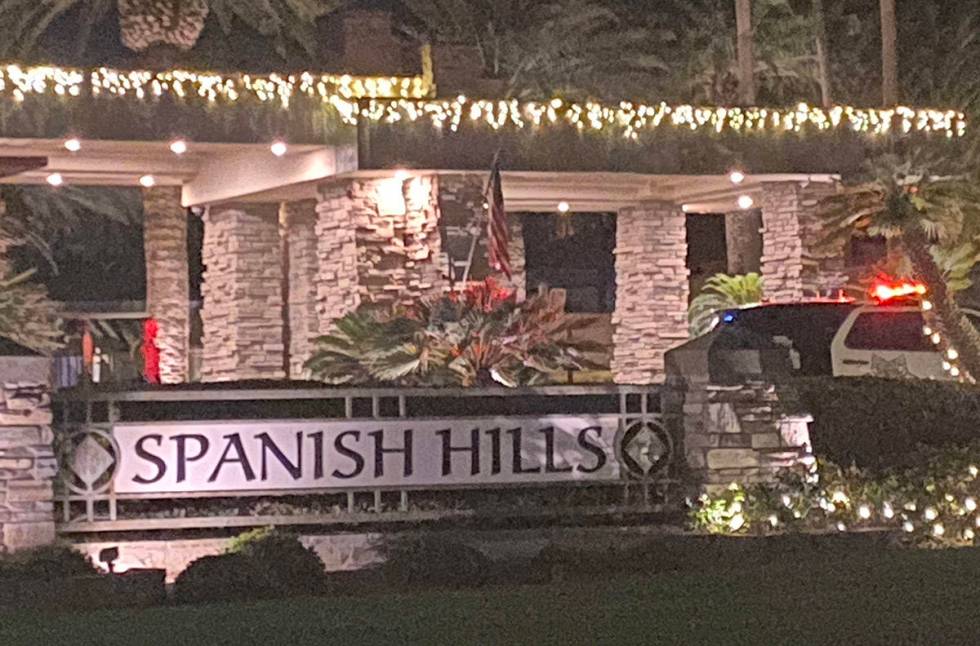 A Las Vegas police SUV at the entrance to the Spanish Hills subdivision where an officer-involv ...