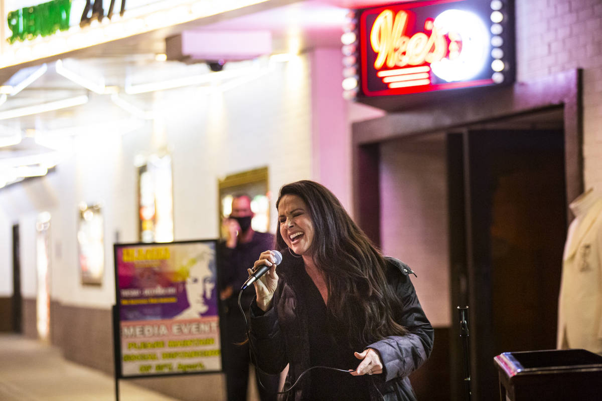 Jennifer Joseph Lier performs at the "Abbey Road Crossing" on Fremont Street in downt ...