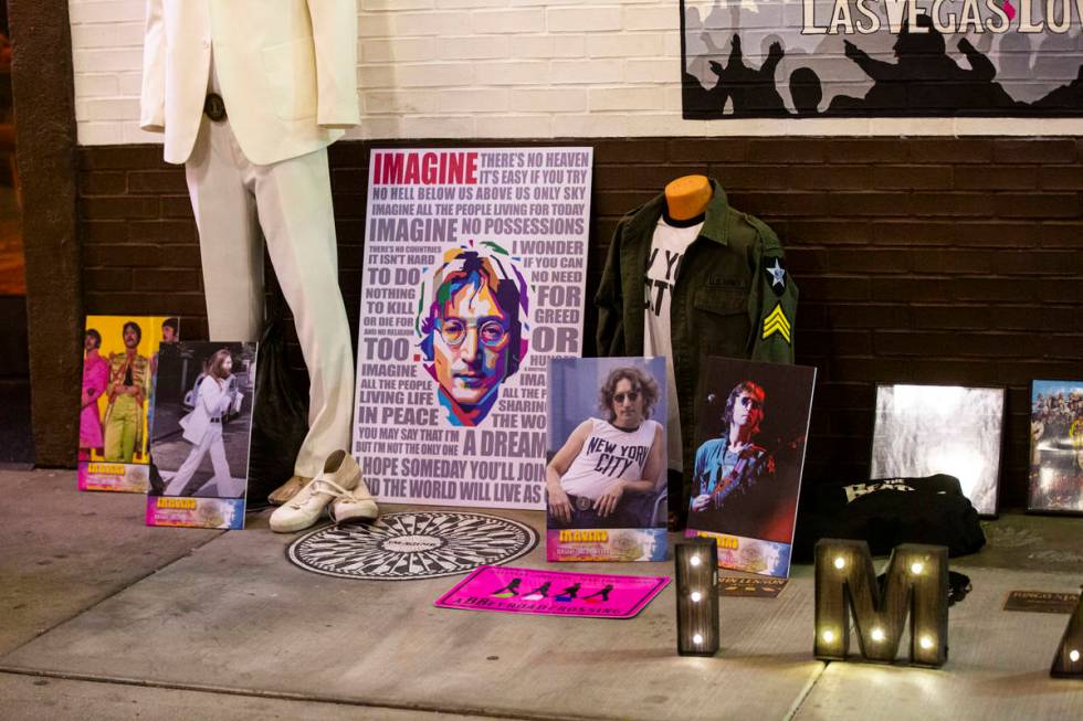 Memorabilia and photos are displayed at the "Abbey Road Crossing" on Fremont Street i ...