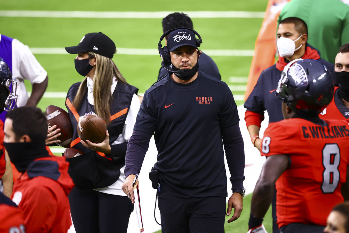 UNLV Rebels head coach Marcus Arroyo looks on from the sideline during the first half of a foot ...