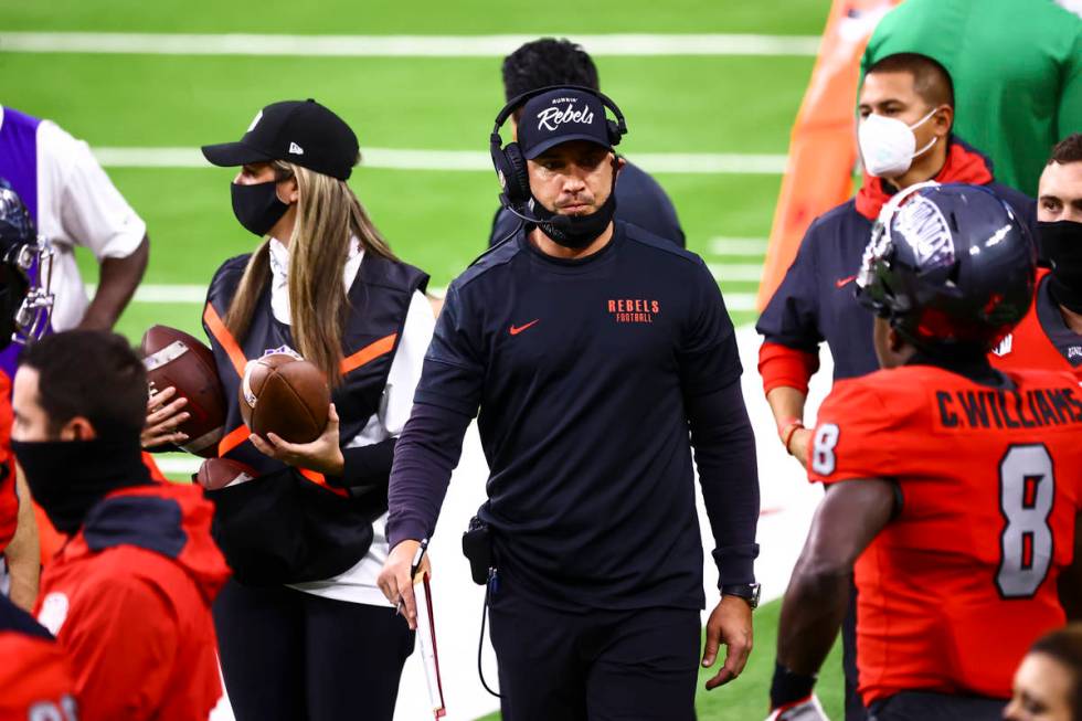 UNLV Rebels head coach Marcus Arroyo looks on from the sideline during the first half of a foot ...