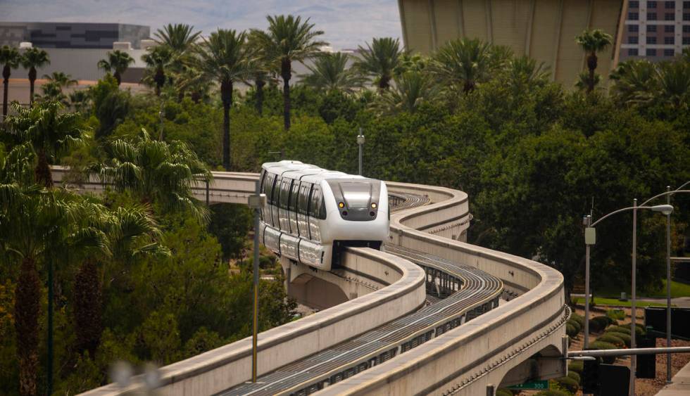 A train makes its way towards the SLS Station along the Las Vegas Monorail system on Sunday, Au ...