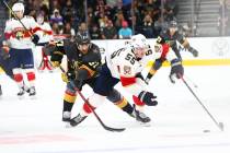 Florida Panthers' Noel Acciari (55) skates with the puck as Golden Knights' Max Pacioretty (67) ...