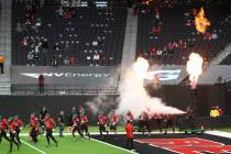 UNLV Rebels take the field for their game against Fresno State Bulldogs during in the NCAA foot ...