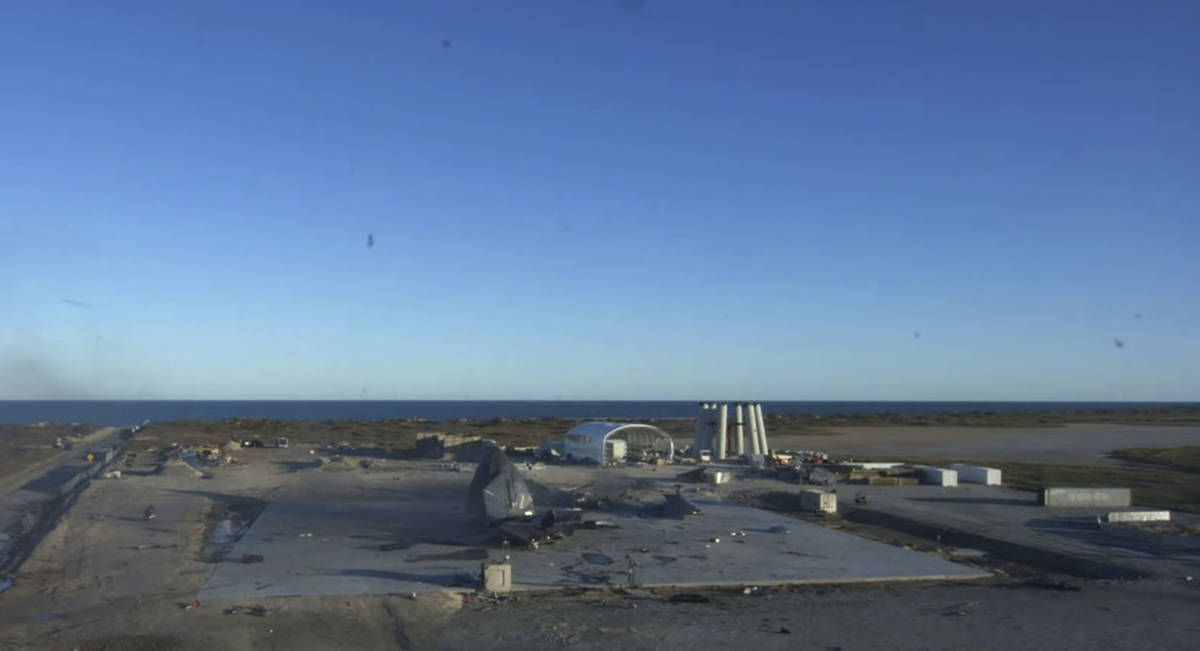 In this screen grab from video posted by SpaceX, the remains of the company's Starship are seen ...