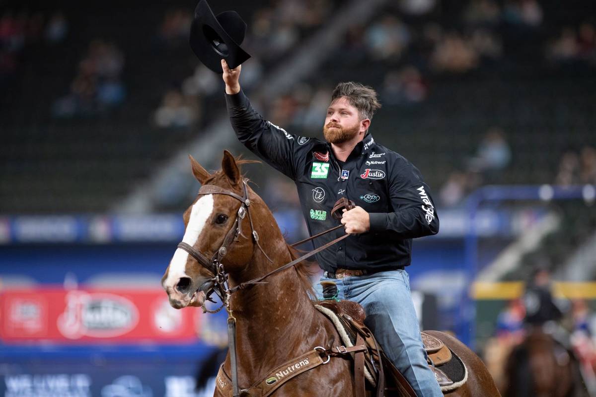 Clayton Hass performs during the 7th go-round of the National Finals Rodeo in Arlington, Texas, ...