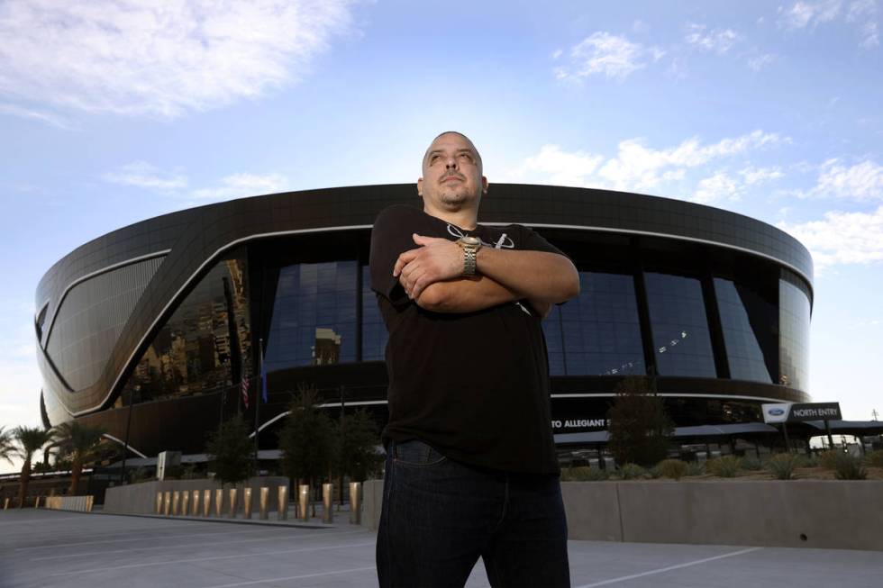 Rick Gonzalez, also known G Minor the DJ, poses for a portrait at Allegiant Stadium in Las Vega ...