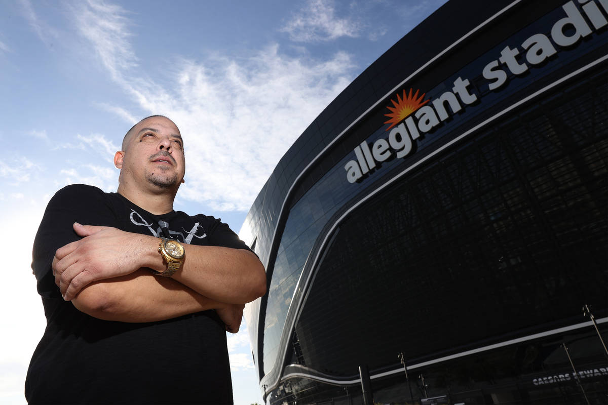 Rick Gonzalez, also known G Minor the DJ, poses for a portrait at Allegiant Stadium in Las Vega ...