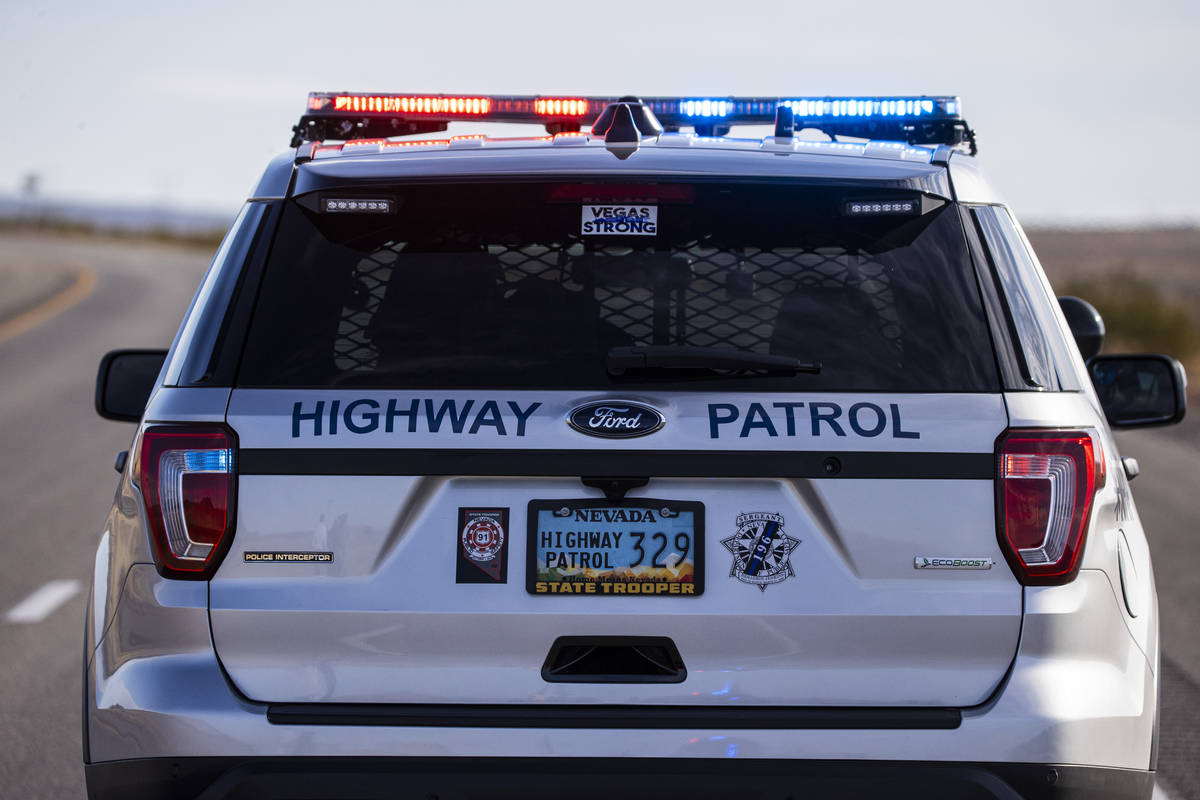 Nevada Highway Patrol troopers respond to the scene of a crash that left at least five bicyclis ...