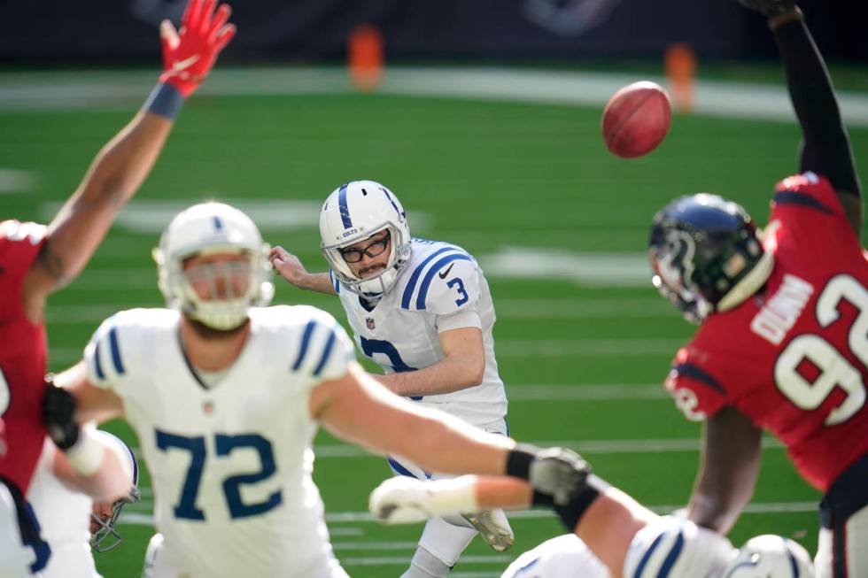 Indianapolis Colts kicker Rodrigo Blankenship (3) kicks an extra point during an NFL football g ...