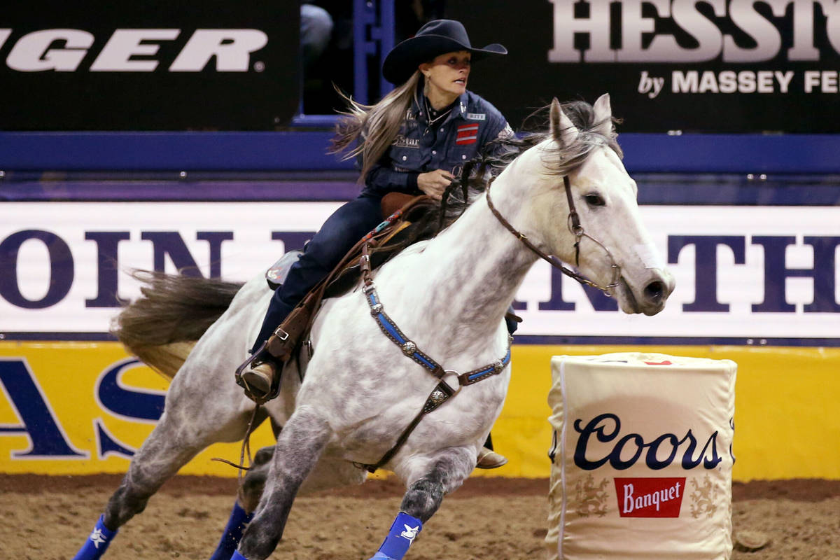 Stevi Hillman of Weatherford, Texas competes in Barrel Racing during the ninth go-around of the ...