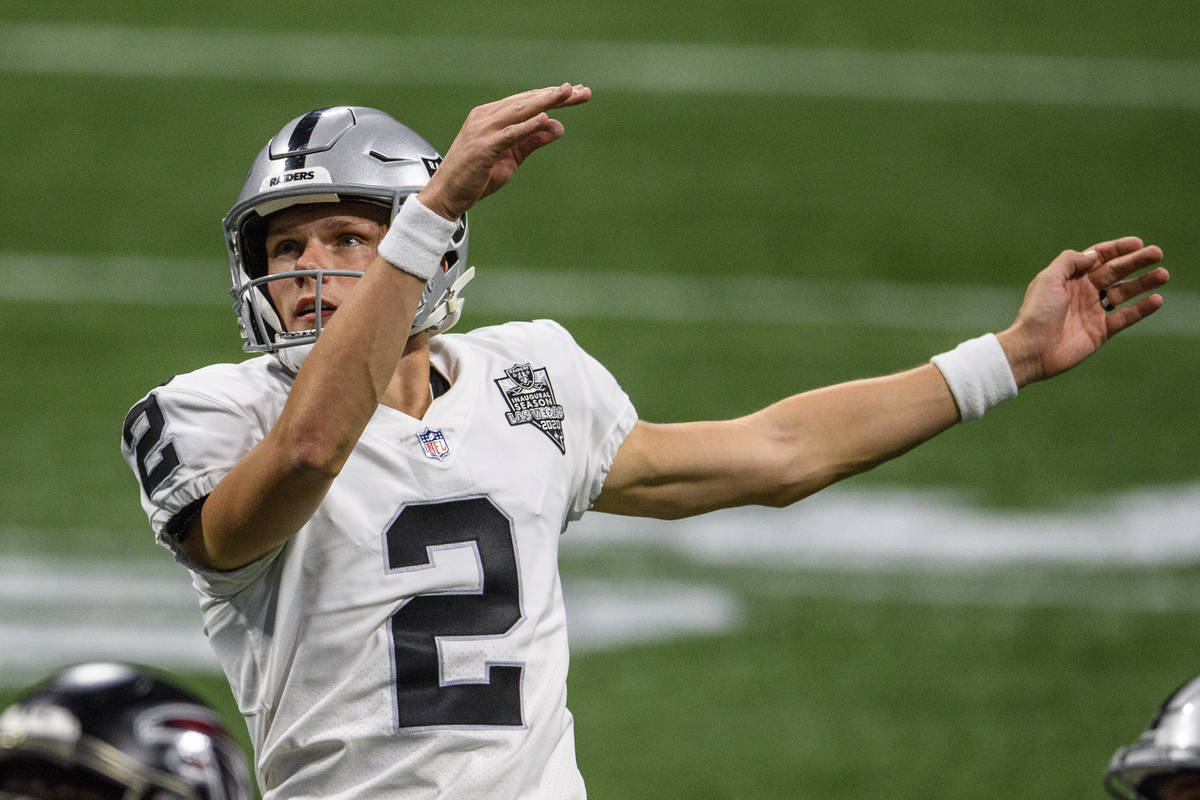 Las Vegas Raiders kicker Daniel Carlson (2) works during the second half of an NFL football gam ...