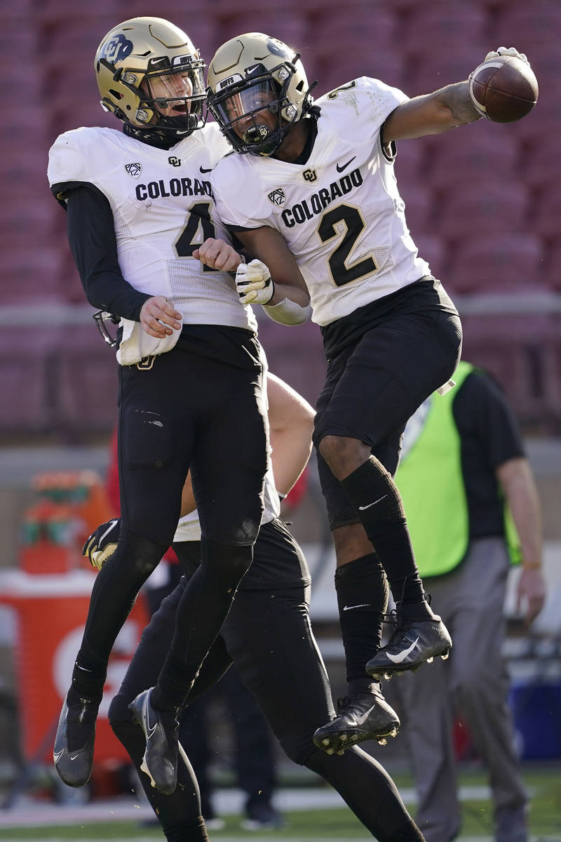 FILE - In this Saturday, Nov. 14, 2020, file photo, Colorado quarterback Sam Noyer (4) and wide ...