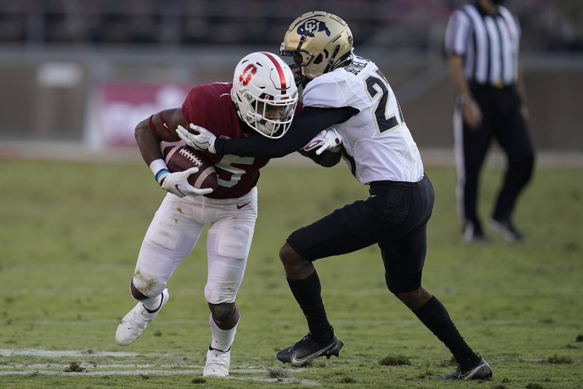 Stanford wide receiver Connor Wedington (5) runs against Colorado cornerback Nigel Bethel Jr. ( ...