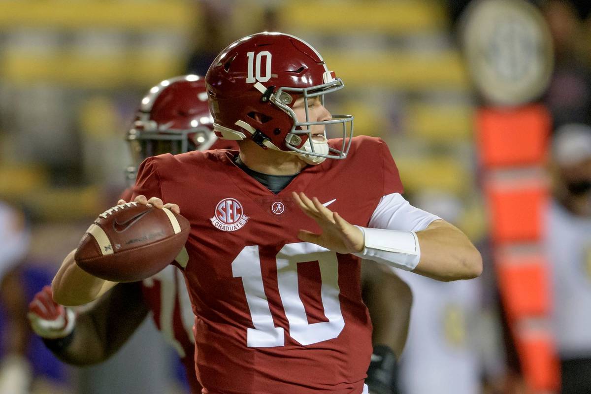 Alabama quarterback Mac Jones (10) throws during the first half of an NCAA college football gam ...