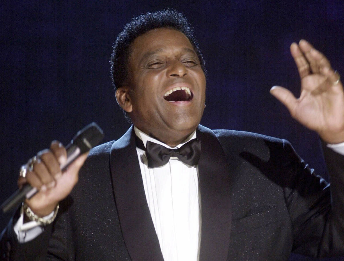 FILE - In this Oct. 4, 2000, file photo, Charlie Pride performs during his induction into the C ...