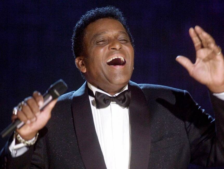 FILE - In this Oct. 4, 2000, file photo, Charlie Pride performs during his induction into the C ...