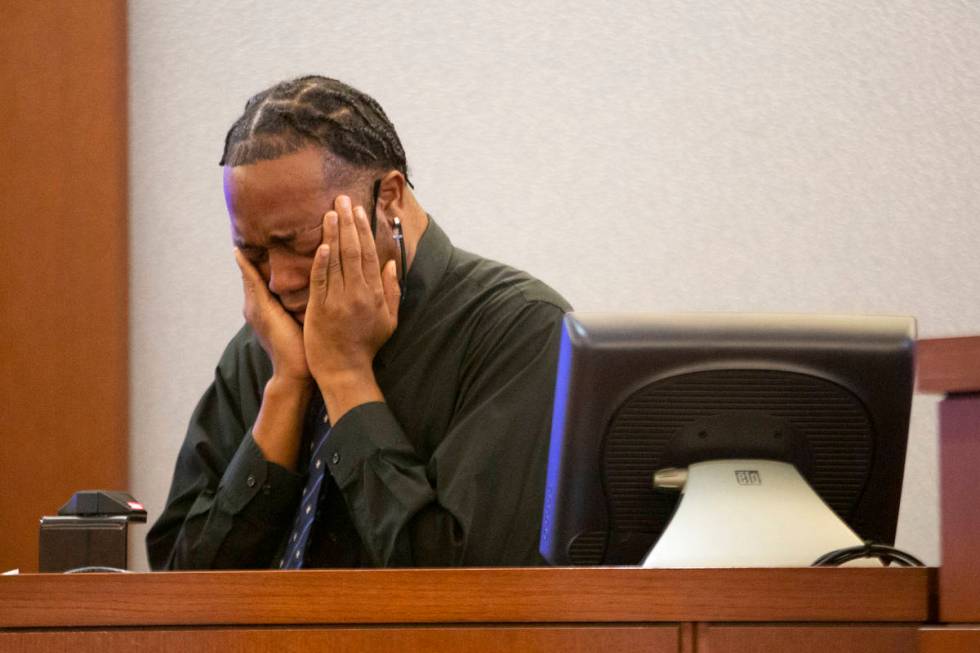 Former Alpine Motel Apartments resident Timothy Henry breaks down in tears during a preliminary ...