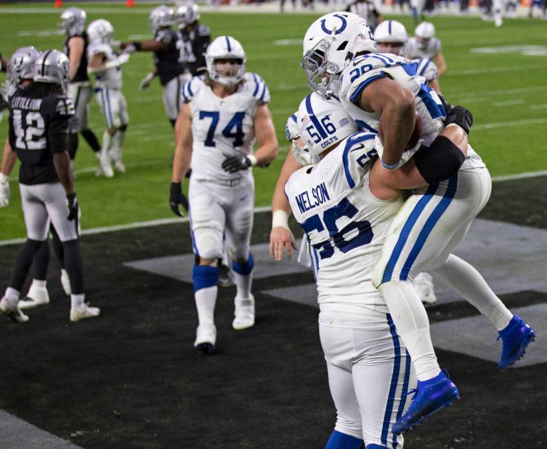 Indianapolis Colts running back Jonathan Taylor (28) celebrates after rushing for a fourth quar ...