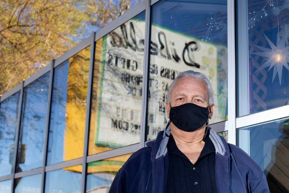 Jon DiBella poses for a portrait outside his store, DiBella Flowers & Gifts, on Monday, Dec ...