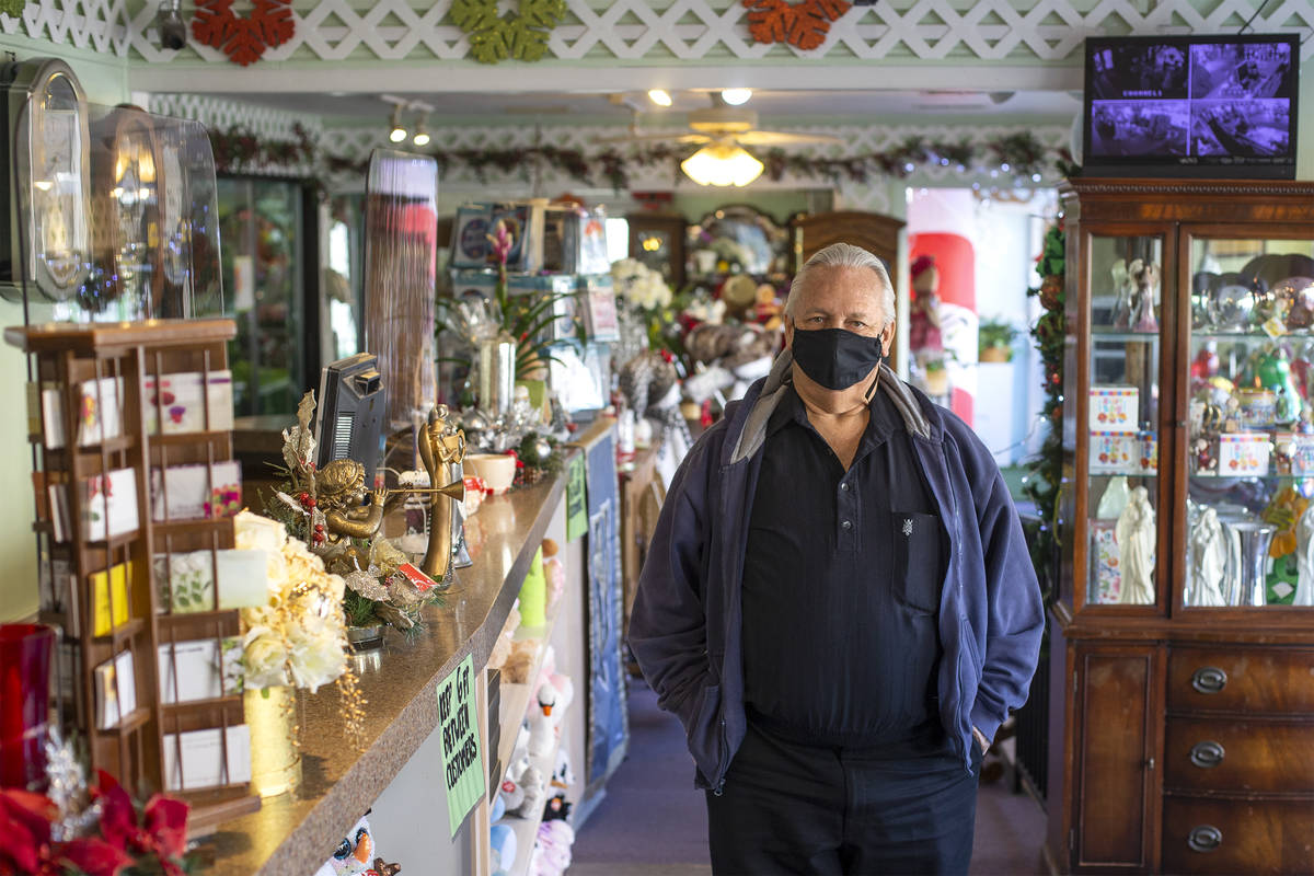 Jon DiBella poses for a portrait at his store, DiBella Flowers & Gifts, on Monday, Dec. 14, ...