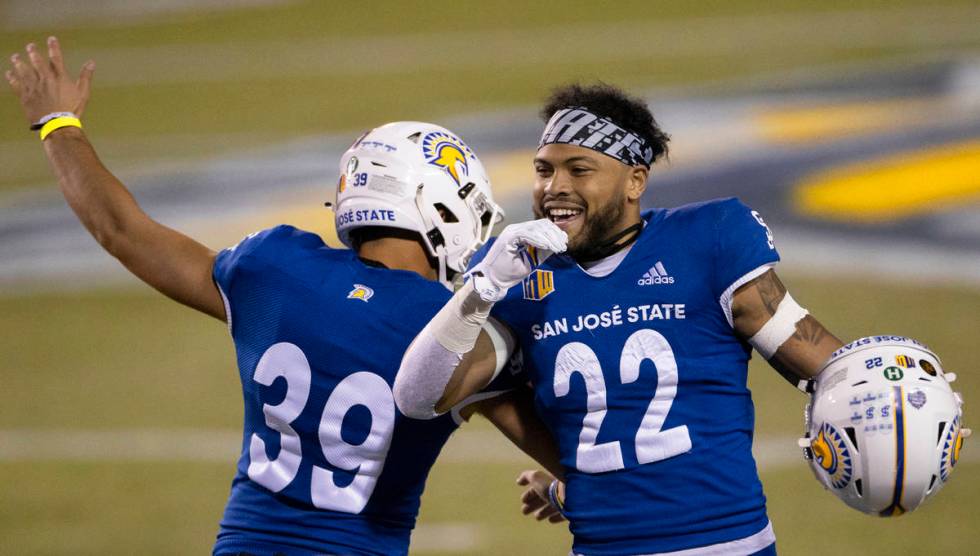 San Jose State Spartans safety Tre Jenkins (22) and San Jose State Spartans place kicker Matt M ...