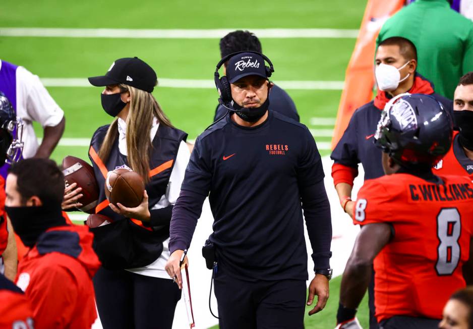 UNLV Rebels head coach Marcus Arroyo looks on from the sideline during the first half of a foot ...