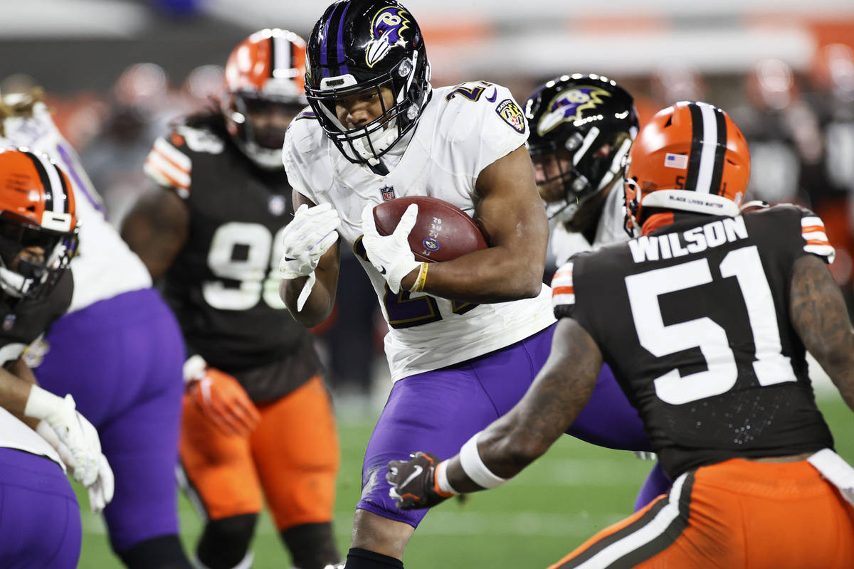 Baltimore Ravens running back J.K. Dobbins (27) rushes for a one-yard touchdown against Clevela ...