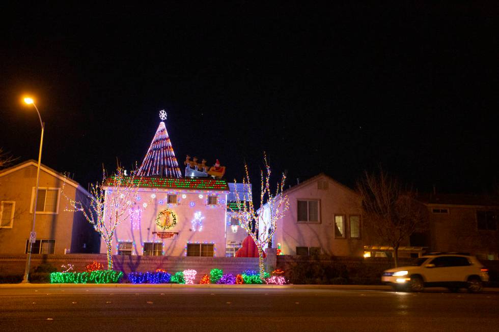 Jeff and Karol Doody's light display wraps around the whole house facing South Jones Boulevard ...