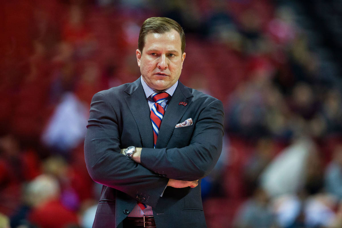 UNLV Rebels head coach T.J. Otzelberger coaches his team in the second half of their NCAA baske ...
