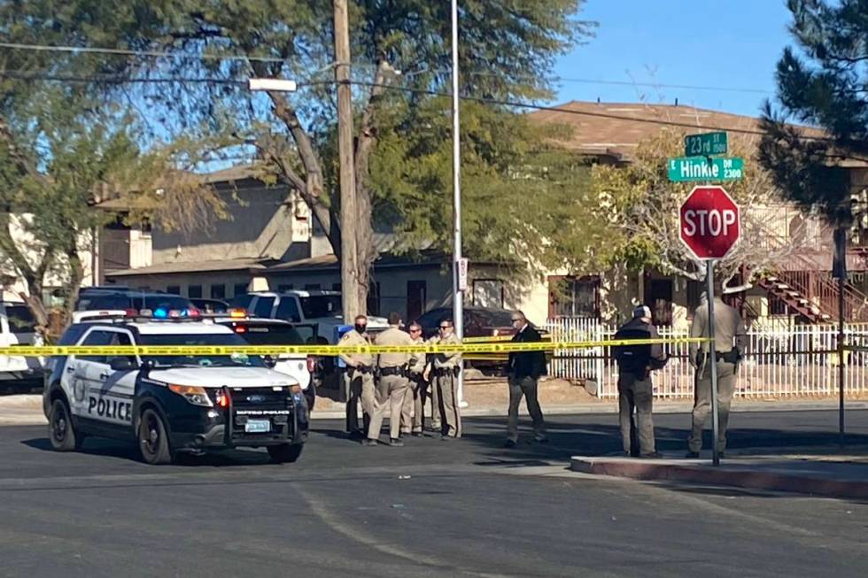 Las Vegas police investigate a shooting on the 1400 block of North 23rd Street on Tuesday, Dec. ...